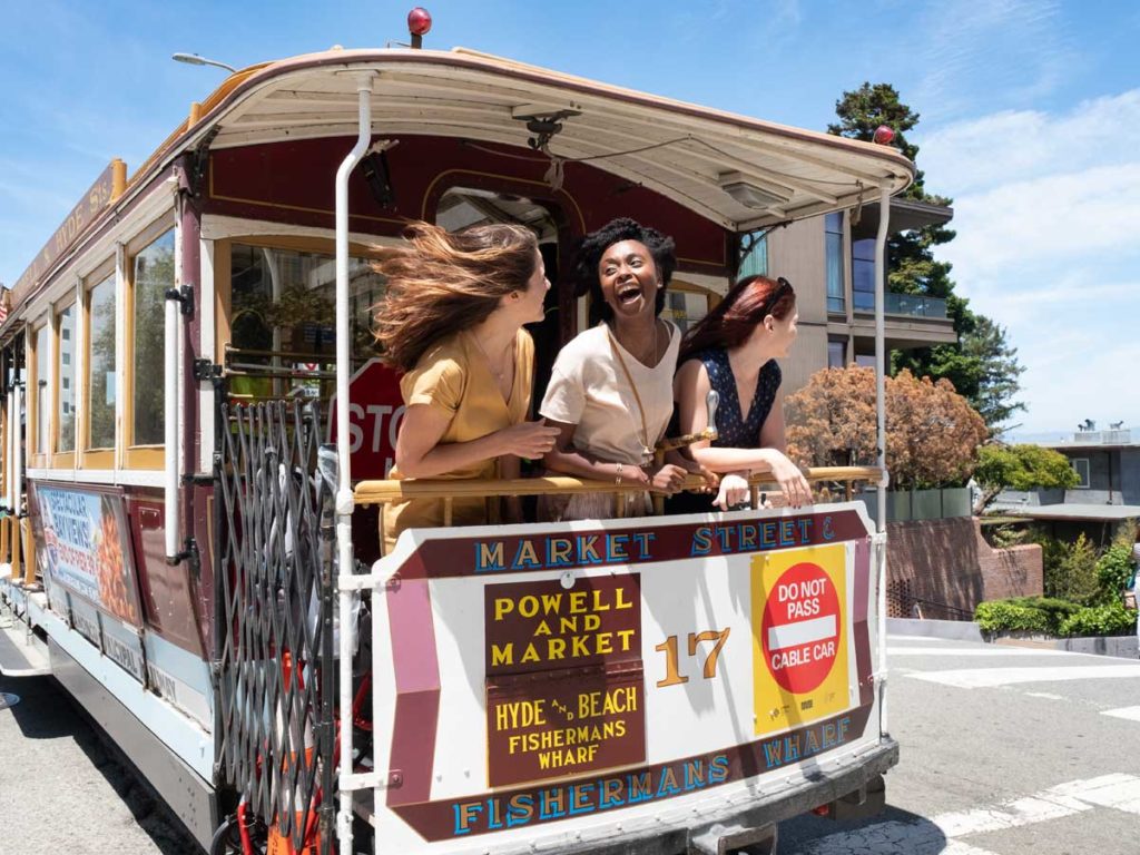 Girls on cable car in San Francisco