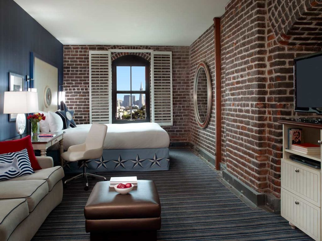 Luxury hotel room in San Francisco with king size bed and sitting area