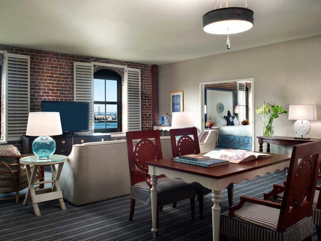 Dining room and sitting room in San Francisco luxury hotel suite
